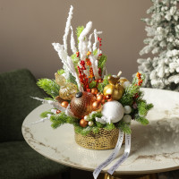 058. Новогодняя композиция в золотом кашпо с оранжево-белым декором